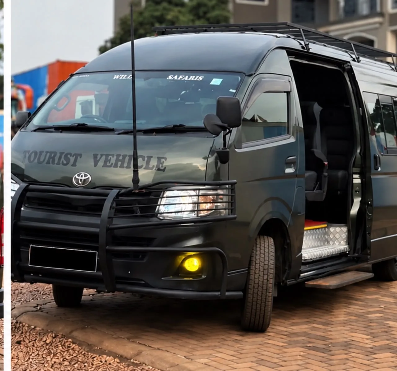 Touring van shown with its side door open